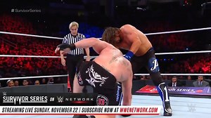 Brock Lesnar escapes AJ Styles' calf crusher by repeatedly smashing his head on the mat