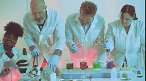 Multidisciplinary team conducts chemical analysis in a lab, measuring and mixing solutions with precision