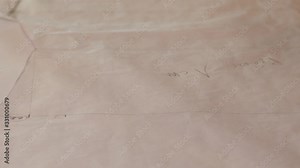 tailor reviewing patterns and hand drawings. In sewing and fashion design, a pattern is the template from which the parts of a garment are traced onto fabric before being cut out and assembled.