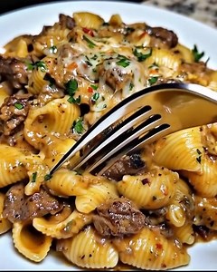 36K views · 216 reactions |  Creamy Beef & Shells Skillet  Rich, cheesy, and absolutely irresistible — this hearty pasta dish is pure comfort in every bite! Perfect for busy weeknights or cozy dinners when you want something filling and delicious. ❤️ .  Get the Full Recipe  (check c.o.m.m.e.n.t)  Hashtags: #CreamyBeefPasta #DinnerRecipes #ComfortFood #CheesyShells #OnePanMeals #HomeCooking #ChristmasYummyTable #TastyToobo | Cooking Recipes | Facebook
