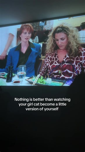 Two Girls and Their Adorable Girl Cat