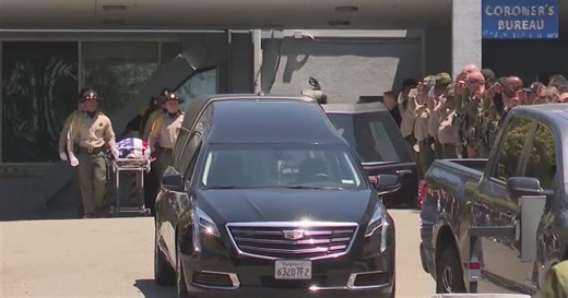 Slain parole agent honored in procession as new details on suspect emerge