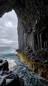 Fingal’s Cave on the Isle of Staffa is a huge sea cave made from perfect hexagon rock columns, where waves echo like music inside. #travel #scotland | UK Hidden Gems