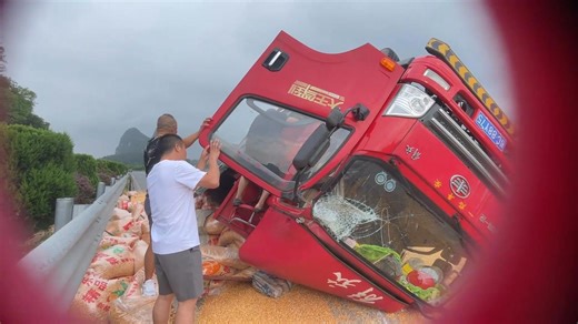 Truck driver rescued from overturned vehicle on remote road in China