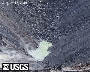 Saturday, July 25, marks the one year anniversary since water was first spotted at the bottom of Halema‘uma‘u, at the summit of Kīlauea. Over the past year, the summit water lake has grown to more than 270 m (885 ft) long and 131 m (430 ft) wide, with a surface area over 2.5 hectares (6 acres). The lake is over 40 m (130 ft) deep with a volume of approximately 480,000 cubic meters (125 million gallons)—equivalent to almost 200 olympic swimming pools. This animated image file (GIF) includes a ser