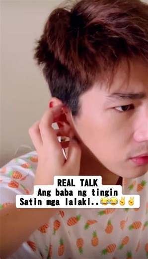 Adjusting Earrings: A Close-Up Look at Style