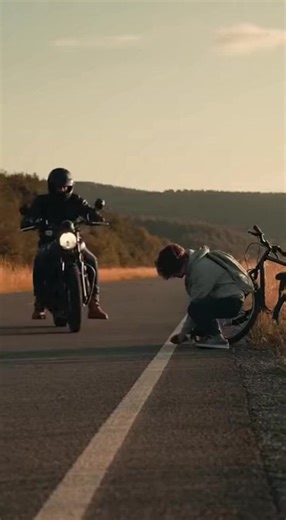 I’LL NEVER FORGET THE KID WITH THE BROKEN BIKE—OR THE MAN IN THE CAR WHO WAS HUNTING HIM. The kid’s bike chain was snapped clean off. But that wasn’t why his hands were shaking. I pulled my Harley over. I’m a big guy—leather jacket, beard, the whole deal—and kids usually flinch when I approach. This one, Finn, barely looked up. He was maybe 15, staring at the useless chain on the gravel shoulder like it was the end of the world. “That’s a mess,” I said, crouching down. “Got a tool kit. We can fi