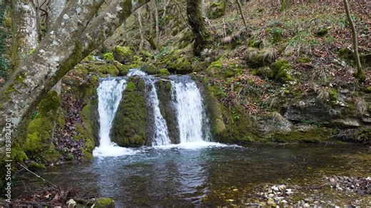 Waterfalls and Cascades of the Nera River (Cheile Nerei Beusnita) National Park, Romania. Hiking the gorge and exploring emerald pools. Romanian beauty and nature.