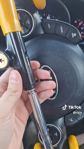 Proper Way to Put on a Bright Yellow Steering Wheel Lock