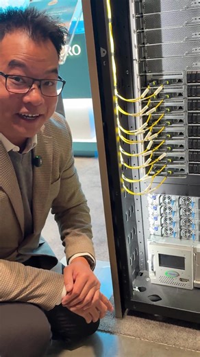 Johnson explores the high-density Supermicro NVIDIA GB300 NVL72 rack, which features an optimized rack design for fast deployment, and an in-rack CDU that provides liquid cooling for the entire rack! Learn more: https://hubs.la/Q03S49620 Follow Supermicro for more videos highlighting the future of AI and HPC. #OCPGlobalSummit2025 #Supermicro #AI #HPC #LiquidCooling #OpenCompute | Supermicro