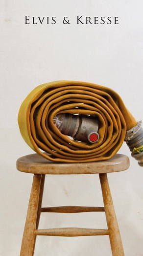 The Elvis & Kresse Tote Bag is made from genuine decommissioned fire-hose and lined with reclaimed cotton. A perfect day bag due to its size and robustness, the tote will keep you dry through a spot of rain and keep its contents dry even in a rainstorm. | Elvis & Kresse