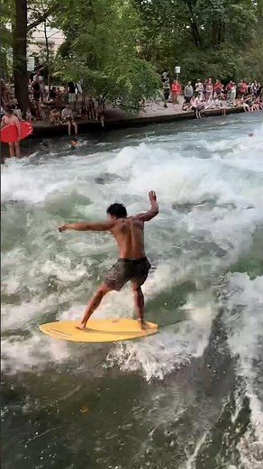 RC surfer takes over river wave
