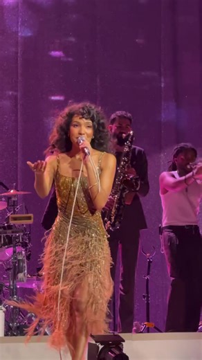 Olivia Dean performing