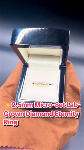 A delicate 2.5mm micro-set eternity ring featuring lab-grown diamonds, beautifully set in 9k yellow gold. The micro setting allows the diamonds to sit closely together, creating a continuous line of sparkle around the band while keeping the ring refined and elegant. The warm tone of yellow gold adds a classic finish that pairs perfectly with other rings or shines on its own. 💛💎 Perfect as a wedding band, stacking ring, or a timeless everyday piece. #eternityring #labgrowndiamond #stackingrings