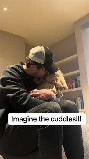 Sweet dog loves cuddles and getting hugs from dad!