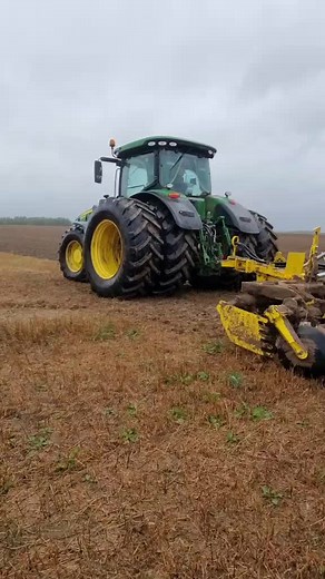 John Deere Tractor Tilling Soil for Planting