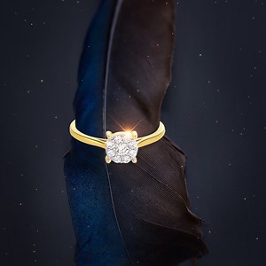 246 reactions · 24 comments | The four-prong-set 18-karat gold ring beautifully embraces a shimmering diamond that's touched with timeless elegance. | Pure Gold Jewellers | Facebook