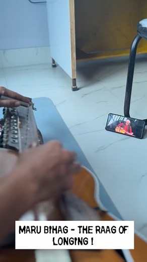 6.1K views · 561 reactions | Playing this beautiful composition taught by Guruji Pandit @vishwa_mohan_bhatt in front of his picture, fills me with deep gratitude. I feel blessed to have learnt this emotional instrument under his guidance. Life can be tough—especially when your aim is to grow and not just to have fun or take music as mere entertainment. True sadhana is often painful, but its rewards are beyond words.” | Roshan Sharma | Facebook