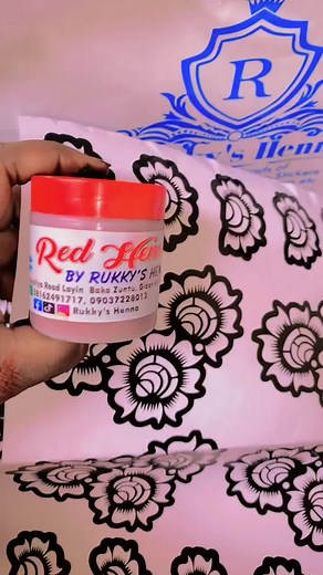 Creating Intricate Floral Designs with Red Henna