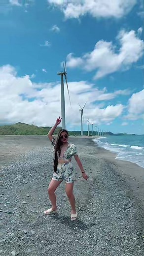 Beach Yoga Poses with Wind Turbines