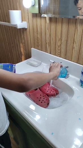 Kree washing his crocs | From Foster 2 4Ever