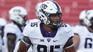 Teammates save TCU player choking on helmet chin strap