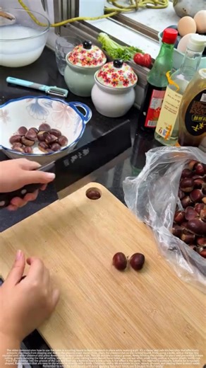 Cleverly using the holes in the cutting board to hold the chestnut in place to make an opening.