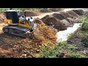 Watch This Giant Truck Dump Tons of Dirt! How Do Bulldozers Move So Much Earth?