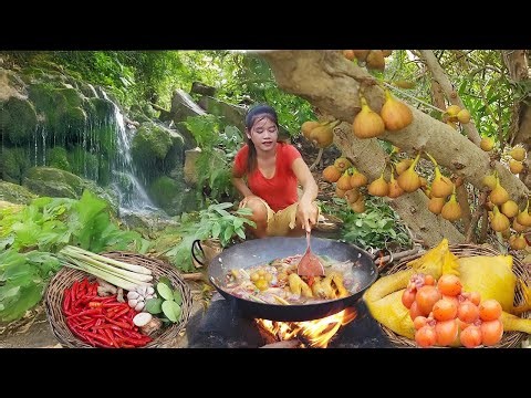Cooking big chicken with special recipe for dinner in forest