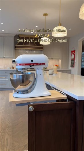 No more wrestling with your stand mixer 🙌 For our client, we solved a familiar kitchen dilemma: leave a heavy mixer on the counter taking up space, or struggle to lift it in and out of a cabinet. We installed a heavy-duty mixer lift so their mixer glides smoothly up to counter height and tucks away again with a soft-close finish. It keeps the appliance hidden in a dedicated cabinet, supports up to 60 lbs, and makes everyday cooking and prep feel effortless! #mixerliftshelf #connordesignbuild #d