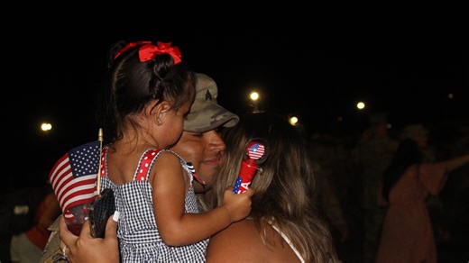 A homecoming worth staying up for: Families greet 3rd ID soldiers returning from deployment