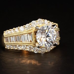 995 reactions · 45 shares | This beautiful vintage inspired @ashidiamonds engagement ring was designed to sparkle and shine. We love the way that row of baguette diamonds catches the light!✨✨ #beardfinejewelers #ashidiamonds #engagementring #engagementringgoals #engagementringshopping #ringoftheday #ringbling #dreamring | Beard Fine Jewelers | Facebook