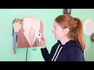 Simone Giertz makes a parent robot that pats her on the back (after she deposits money into it)