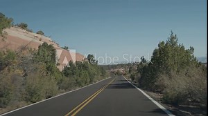 Colorado National Monument Park near the city of Grand Junction. Sheer-walled, Red rock canyons, Rim Rock Drive, Towering monoliths within a vast plateau and canyon panorama USA