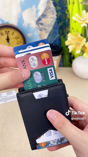 Compact minimalist bifold wallets integrate money clips with advanced RFID pop-up holders. #wallet #mensstyle #minimalistwallet #sohochic #TikTokShopSale