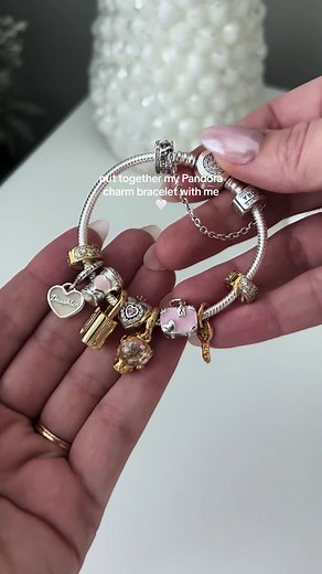 Gold and Silver Pandora Bracelet with More Gold Charms