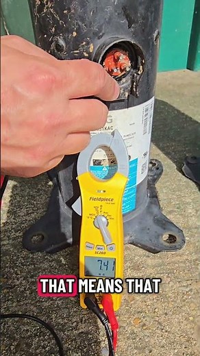 hvac technician shows how to check a compressor to see if it is grounded