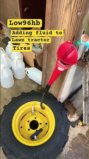 Adding fluid to lawn tractor tires #shortsvideo #tractor #how #gravity #howto