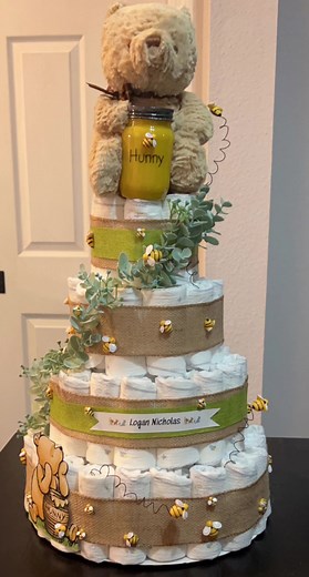 I made a vintage Winnie the Pooh diaper cake for a very sweet momma to be. #diapercake #winniethepooh #diapergift #babyshower
