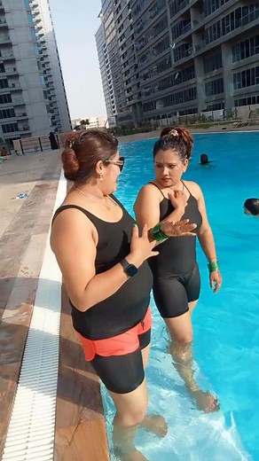 Conversations by the Pool: Women Enjoying Sunshine