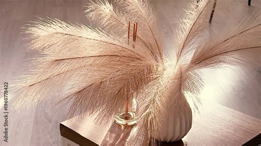 A beautiful boho-style interior of a business office or beauty salon. Sunlight streams through the window into the room.