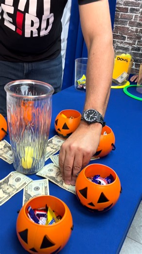 197K views · 742 reactions | Halloween prize game where players throw ping pong balls into a vase for candy and cash | Doug and Friends | Facebook