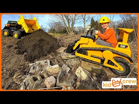 Paving rocky slope with kids ride on dump truck, bulldozer, and side by side. Educational | Kid Crew