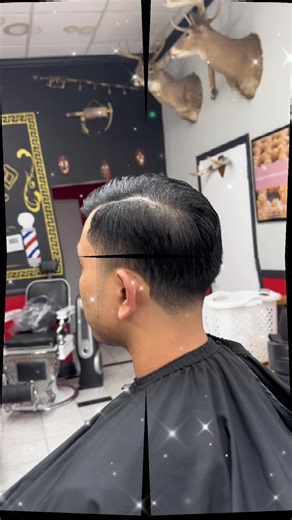 Comb-Over with Low Skin Fade: A Stylish Barber Creation