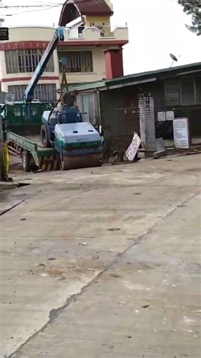 Unloading a compactor #construction