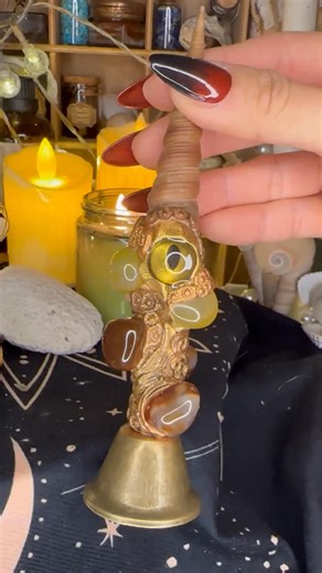 EEshells Witch Shop on Instagram: "Not all sea familiars are silent. 🔔🌊 This Witch Bell Sea Familiar is crafted from a natural auger shell, yellow and red agate, and bound with a ritual bell. She marks beginnings. She clears space. She watches while you work. Ring with intention. She listens. #WitchBell #RitualTool #SeaWitch #WitchRitual #HandmadeMagic Spellwork OccultAdornment RitualBell WitchcraftTools"