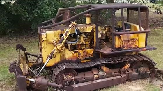 An Allis Chalmers HD16 returns to work