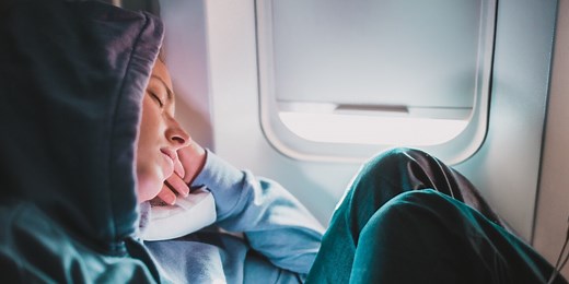 Does Melatonin Really Help You Sleep on a Flight? We Asked Medical Experts