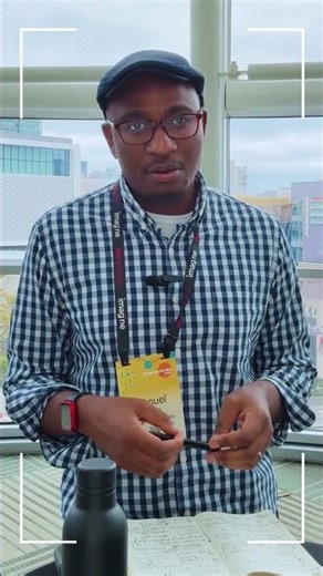 Fanuel Muindi talks with practitioners at the Association of Science & Technology Centers Meeting