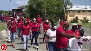 Public servants in Tobago march along the Claude Noel Highway, Lowlands, at Sunday's Labour Day rally. Video by David Reid | Trinidad and Tobago Newsday